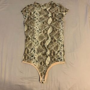 Mesh snakeskin bodysuit